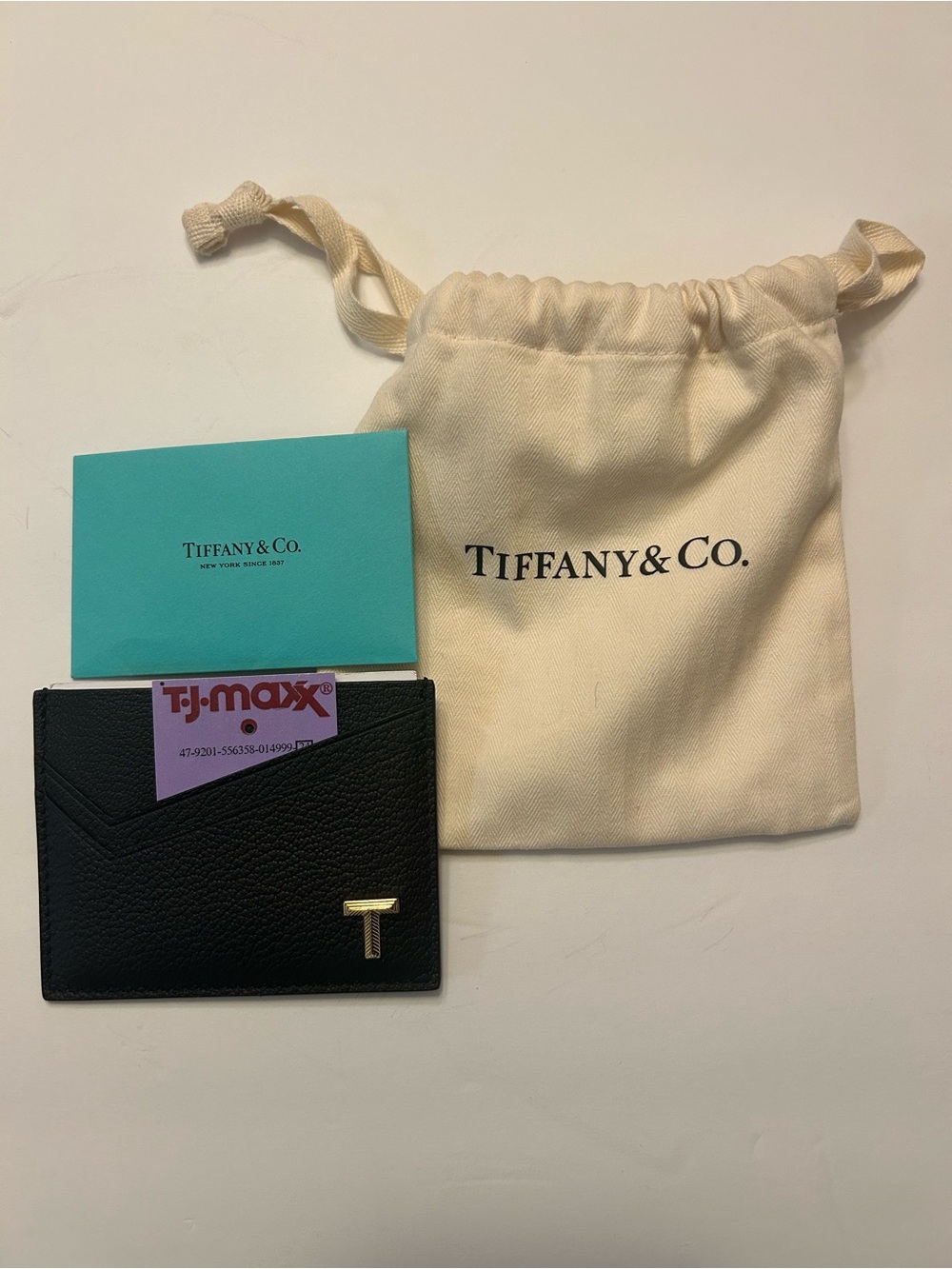 Tiffany & Co. Black Leather Gold T Card case part of the Tiffany T Collection